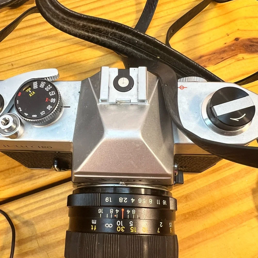 Yashica Black and Silver Film Camera with Rangefinder Design‎